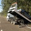 Plataforma Autossocorro recolhendo carro.